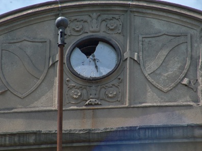 Broken Glass on Clock in front of school - Back to the Future